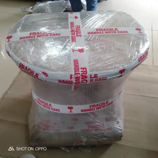 Fragile item wrapped with tape – Nation Packers And Movers