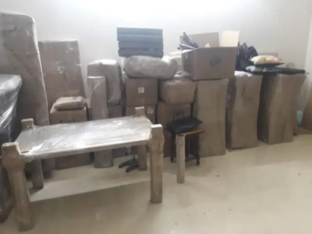 Packed goods with table – Nation Packers And Movers